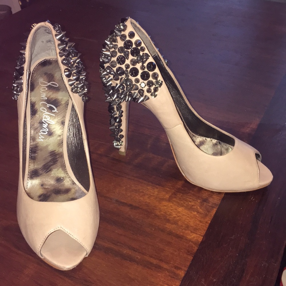 Nude studded peep toe pumps